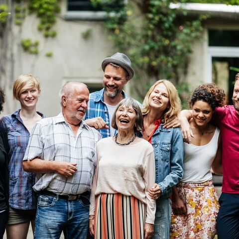 Group of people pose for a family photo