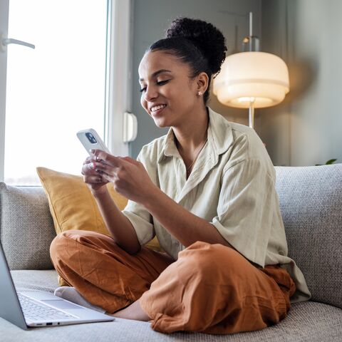  Young woman shopping online