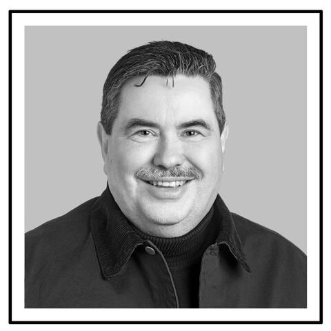 Schwarzweisses Portrait von Martin Friederich, verstorbener Hauptagent von Konolfingen, eingerahmt in einen Trauerrahmen.