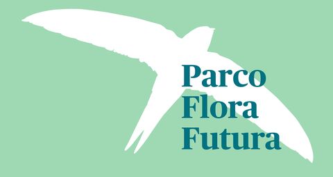 Grafico di un uccello in bianco con Flora Futura Park in verde davanti.